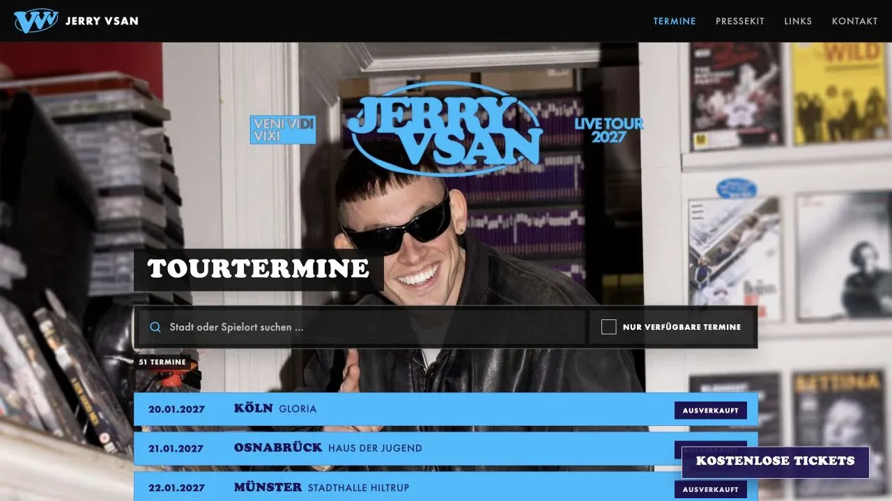 Jerry Vsan website with blue tour branding, photography, and upcoming shows.